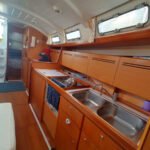 The galley is fully equipped, including cookware and tableware. In particular there is a sink-in fridge and frontal fridge-freezer. The kitchen sink has a third tap with a 5-cartridge ultra-filtration device connected to the boat water tank. Also an automatic cool water dispenser is available next to the sink.