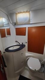 Bathroom. Two of the toilets are automatic and one is manual.