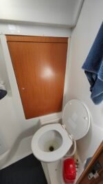 Bathroom. Two of the toilets are automatic and one is manual.