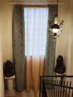 The staircase to the upper floor with the African King and Queen.