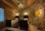 Stanza Alexandros, takes its name from the bassrelief next to the entrance. Decorated with old Norman and Sicilian furniture and traditional carpets and fabrics is bathing in a soft, filtered and stone-cold refresing atmosphere will certainly provide you with the right conditions for a good night rest. Of course the night will be perfect when the Old & Wise One (OWO) Olive tree guards your entrance. Perfect for friends, couples or families with a small child.
